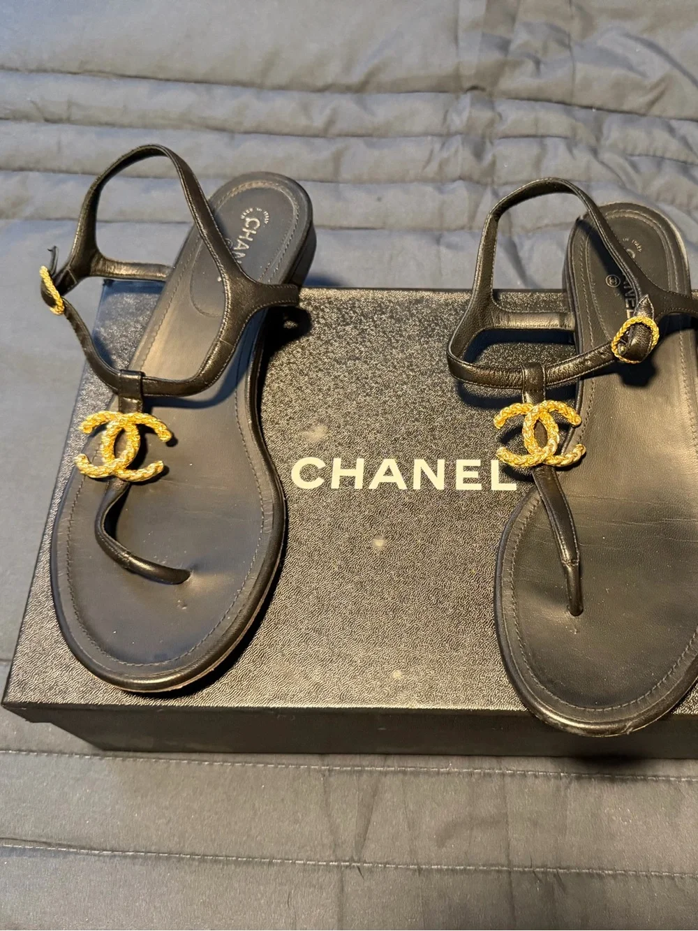 CHANEL Black Leather T-Strap Sandals with Gold CC Medallions